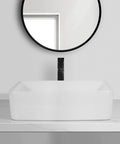 USZWBY Vessel Sinks Bathroom Vessel Sink Hotel Apartment Square Ceramic Wash Basin Home Art Table Bathroom Bowl Sink with black faucet and round mirror.