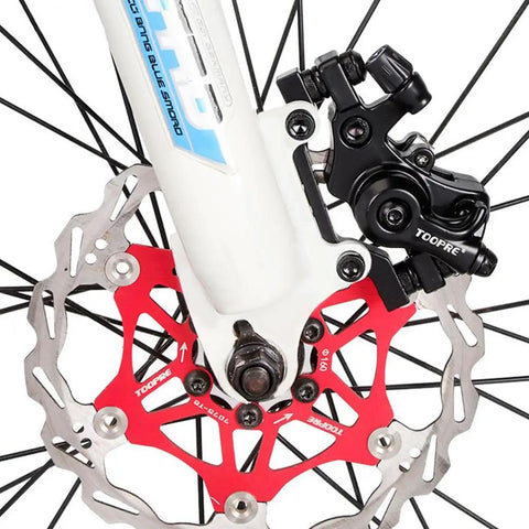 High Quality Mechanical Disc Brake Set For Mountain Bike Featuring Front And Rear Aluminum Alloy Calipers With Killer Stopping Power And Street Tough Build Quality That Lets You Shred Trails Without A Care While Rolling Smooth; close-up view of front brake caliper and rotor.