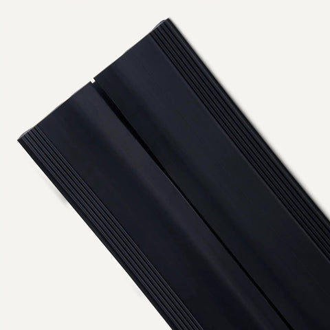 Floor Cord Cover 6 Foot Cable Protector For Wires And Cords Black Low Profile Ramp That Wheels Roll Over Smoothly Keeps Cables Tidy No Trip Hazards Durable Floor Cable Management Solution, black PVC close-up