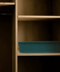 Slick Multi Compartment Heavy Duty Plastic Drawer Storage Container With Secure Top on a wooden shelf.