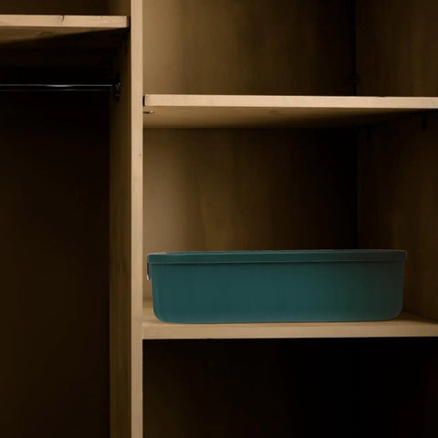 Slick Multi Compartment Heavy Duty Plastic Drawer Storage Container With Secure Top on a wooden shelf.