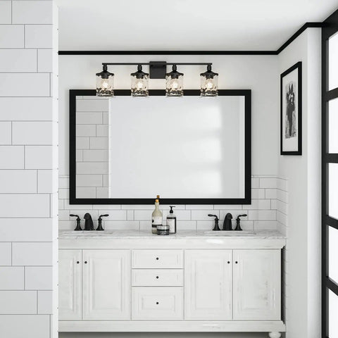 Colton Mid-Century Clear Water Glass Bathroom Vanity Light, Four-Light Matte Black Wall Fixture above white bathroom vanity