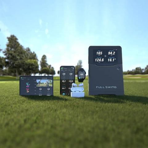 Golf Launch Monitor And Simulator Kit With 16 Data Points And 5D AI Radar on grass field displaying data on devices