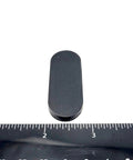 2 Inch By 3/4 Inch Oval Silicone Bumper Feet 3/16 Inch Thick With Strong Adhesive Backing viewed with ruler for scale
