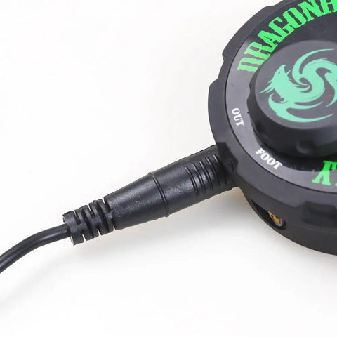 Close-up of Universal DC Power Cord For Tattoo Machines With Pen Rotary Systems connected to a Dragonhawk power unit