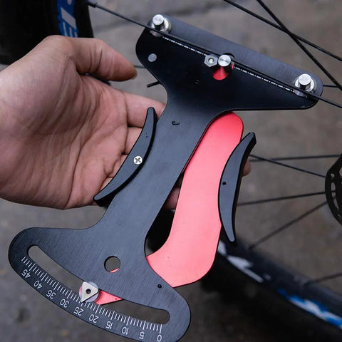 Spoke Tension Meter For Bikes Aluminum Alloy Tensiometer Gauge in hand measuring wheel spoke tension for road and mountain bikes