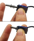 Two Pack Mini Push Pull Linear Solenoid Electromagnet With 5mm Stroke, DC 5V To 12V, 25 Ohm, shown held between fingers