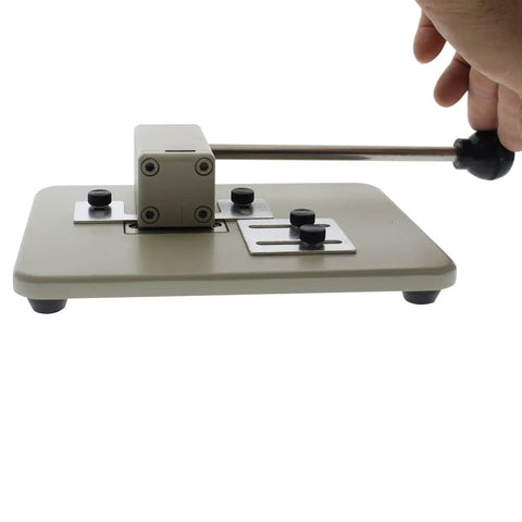 Heavy Duty Desktop Slot Punch For ID Cards And Bulk Badges With Precision Adjustable Slide Guides, side view showing handle.