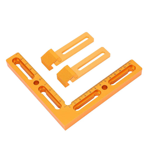 Top Shelf CNC Workpiece Positioning Fixture Kit For Woodworking Vises And Slick CNC Milling Rigs in orange aluminum, includes clamps.