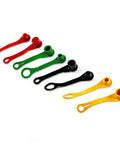 Eight plastic hydraulic fitting coupler protective covers in red, green, black and yellow for John Deere port plugs