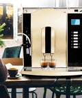 Front view of One Touch Fully Automatic Espresso Machine With 1.6L Water Tank 20 Bar Pressure Milk Frother Arm Auto Clean Anti Drip Adjustable Grind Black in a cafe setting