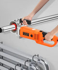 Heavy Duty Badass Portable Electric Pipe Threader Kit With Six Beefy Dies For Half To Two Inch Iron And Galvanized Tubing No Sweat Setup 2300 Watt Motor in use with metal pipe.