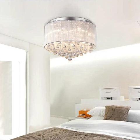 Flush Mounted Luxury Contemporary Drum Ceiling Chandelier Light Fixture With Cylinder Lamp Shade For Bedroom Dope Silver Crystal Rain Drop Decor 45x45x23 Cm Shade 35 Cm Base 3 Year Warranty Easy Install in a modern bedroom setting