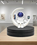 Huge 6.1 And 7.5 Inch Electric Rotating Display Stand With Remote Control For Jewelry And Collectibles 360 Degree Spin Turntable with astronaut figurine.
