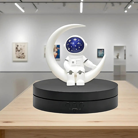 Huge 6.1 And 7.5 Inch Electric Rotating Display Stand With Remote Control For Jewelry And Collectibles 360 Degree Spin Turntable with astronaut figurine.
