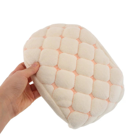 Hella Cozy Beige Plush Motorcycle Seat Cover With Super Warm Winter Fluffy Padding held in hand, featuring soft padded quilted design.
