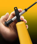 Hand holding Four In One Grease Injection Gun Kit With Brass Needle Tip And Zerk Fittings For Precise Grease Application