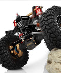 Close-up of a 1/18 TRX4M crawler climbing a rock with the Beefed Up 9KgCm Metal RC Servo for 1 18th TRX4M Crawler High Torque Digital Coreless HV.