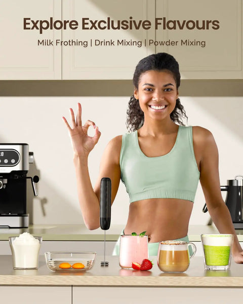 Woman using Rechargeable Milk Frother Handheld USB C Foam Maker With Detachable Stainless Steel Whisk Mini Drink Blender for lattes and cappuccino.