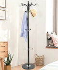 Straight Up Heavy Duty Four Tier Floor Standing Coat Rack With Ten Sturdy Metal Hooks For Bedroom Hallway Wardrobe Closet Organizer Keep Your Gear Dang Tidy Today with striped shirt and hat.