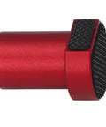 Close-up view of a red 4 Pack 20Mm Bench Dogs With Non Slip Pad Aluminum Alloy Table Stop for woodworking benches.