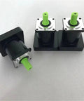 Premium High Speed Planetary Gearbox And Precision Drive Gear Reducer with green shafts for heavy duty machinery tasks.