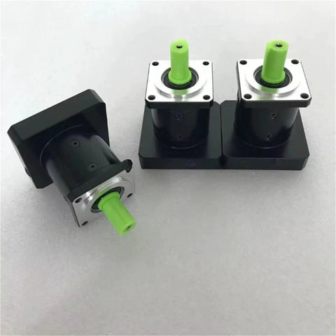 Premium High Speed Planetary Gearbox And Precision Drive Gear Reducer with green shafts for heavy duty machinery tasks.