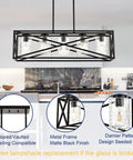 Kitchen view of Boss Level Farmhouse Linear Chandelier with textured seedy glass shades, matte black finish, five light fixture.