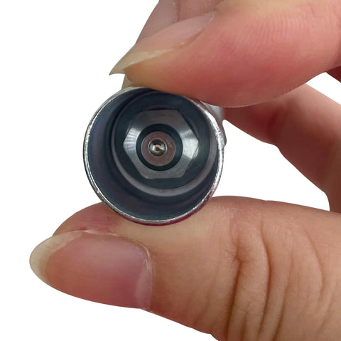 Close-up of Bonsicoky 90-degree grease gun adapter, silver metal tip with inner hex socket, held by fingers