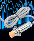 8mm NPN NO Inductive Proximity Switch Sensor, 12-24V DC (6-36V), 2-Wire, metal body with coiled cable against blue background