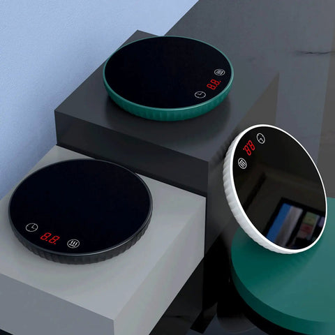 Tempered Glass Top Cup Warmer Pad With Digital Display And Auto Timer To Keep Your Morning Brew Piping Hot And Dodge The Cold Coffee Blues On Busy Weekdays on a countertop