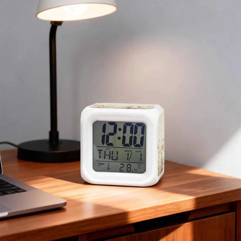 Solid Butterfly Floral Digital Alarm Clock With Silent Sleep Mode And Chill Nightlight Displaying Time Date And Temperature For Bedroom Or Desk Featuring Lowkey Vintage Accents And Squishy Buttons on a wooden desk with laptop.