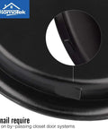Close-up of round matte black finish showing snap-in mechanism of 8 Pack Closet Door Finger Pulls 2-1/16 Inch Round Sliding Door Handles