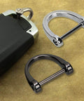 Six Pieces D Shape Key Ring Shackles With Screw Shackle In Black Silver Gold next to car key for durable keychain hardware