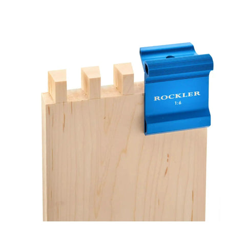 Dovetail Saddle Square 1 To 6 9.5 Degree Angle Marking Tool for softwoods, blue anodized aluminum on wooden piece with joints visible