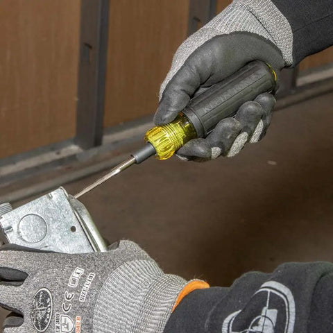 Person using 6 In 1 Tapping Tool From Klein Tools With Cushion Grip For Repairing And Cleaning Threads Auto Re-Threads To Next Size If Stripped