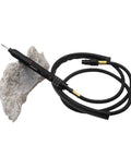 Mini Pneumatic Die Grinder Kit High Speed Adjustable Air Polishing Pen For Engraving And Detail Work connected to air hose resting on rock.