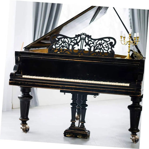 Heavy Duty Vintage Brass Plate Caster Wheels For Furniture And Workbenches Pack Of Four Two Inch Universal Rollers that glide smoothly under a grand piano.