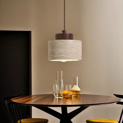 Modern Mini Pendant Light, Travertine Stone Light Fixture with Wooden Accent above a dining table, ambient lighting.