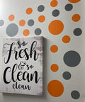 Bold Orange And Grey Polka Dot Vinyl Wall Decals Set Of 30 Removable Adhesive Stickers for nurseries displayed on wall