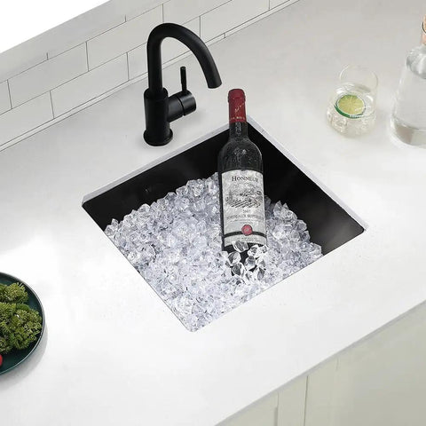 17x15 Black Undermount Bar Sink Built To Last For Home Bars And Prep Stations Pro Grade Heavy Duty Stainless Steel filled with ice and a wine bottle