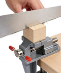 Heavy Duty Cast Iron Bench Vise With 360 Swivel Base gripping a wooden block for precise craft and woodworking projects.