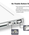 Close-up view of concealed sliding barn door 36 by 84 inches shaker style flat one panel white primed, showing bottom roller setup