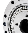 Close-up of Solid As A Rock High Precision Cylindrical Gear Reducer with hard tooth surface and ball bearings.