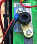 Close-up of installed 12V Side Post Battery Disconnect Switch Kit For Cars Two Pack Quick Disconnect Battery Cut Off And Kill Switch.