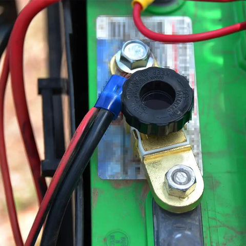 Close-up of installed 12V Side Post Battery Disconnect Switch Kit For Cars Two Pack Quick Disconnect Battery Cut Off And Kill Switch.