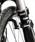 Close-up of bicycle tire mounted on Portable Bicycle Wheel Truing Stand For Quick Rim Adjustments Compact Lightweight Wheel Repair Tool