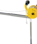 Drill Powered Wire Tugger For Electricians With 800 Pound Pull And 1 To 30 Gearbox mounted on stand with cable outlet