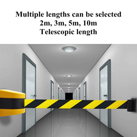 Wall mounted Heavy Duty 10 Meter Retractable Belt Barrier for security in a hallway, featuring yellow and black nylon ribbon.