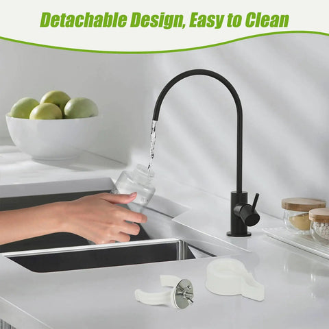 Detachable design easy to clean kitchen faucet pouring water into jar with black handle and bowl of apples in background.